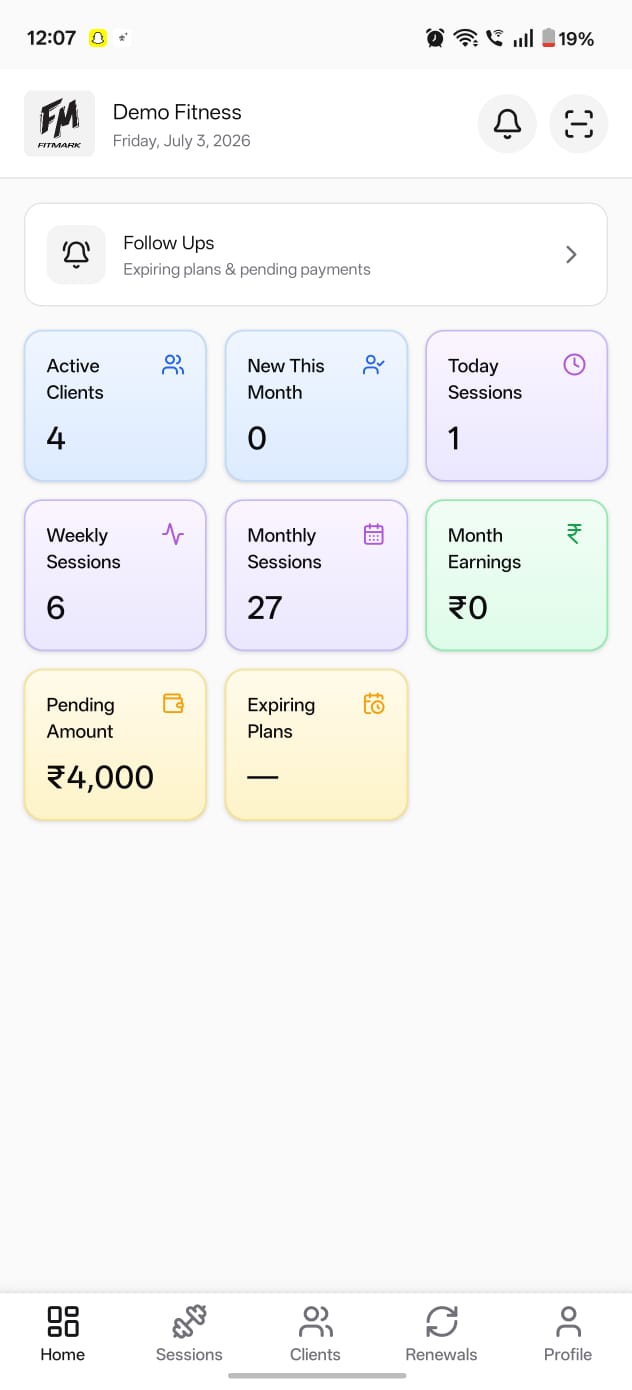 Fitmark trainer app home showing sessions, clients, and earnings